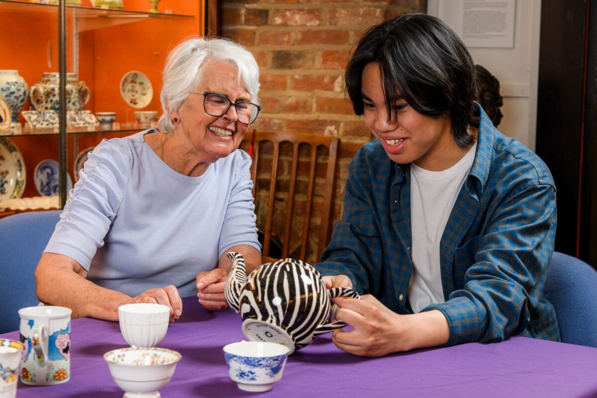 a woman and a man handling collections