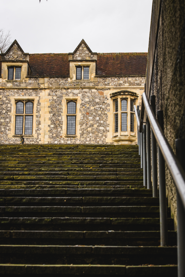 A view of The Great Hall exterior taken from the bottom of old stone steps