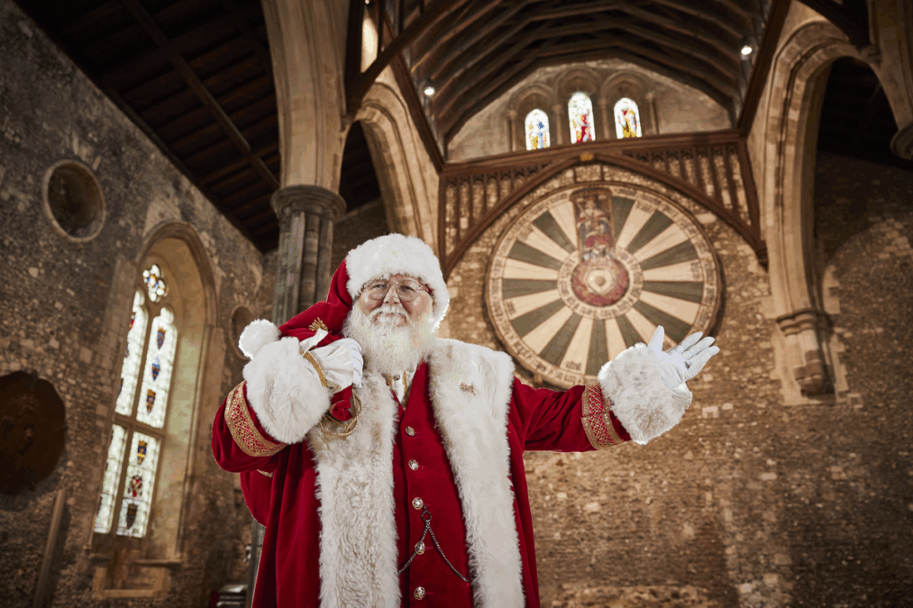 Santa gestures towards The Round Table