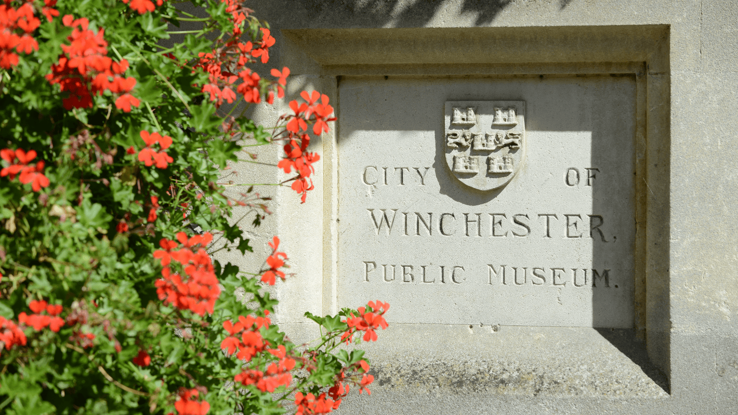 Image of stone plaque outside City Museum stating City of Winchester
